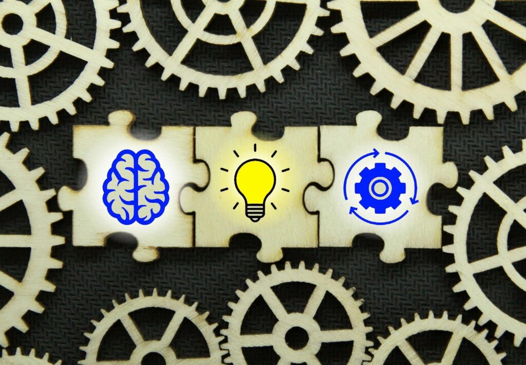 puzzle with brain, idea and management icons.