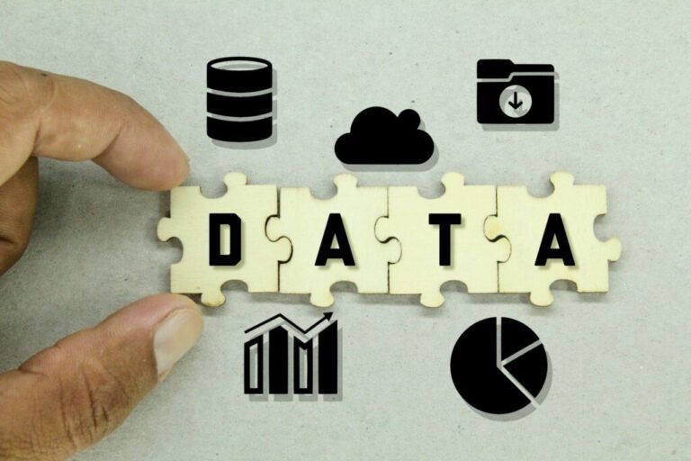 Wooden puzzles with data icons and data words. data concept