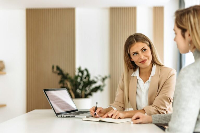 Boss and client, talking to each other at boss office.