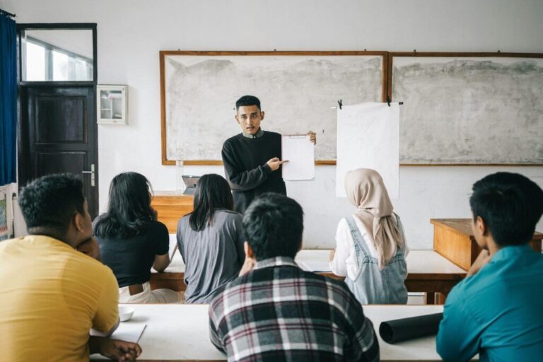 Students Paying Attention To Their Teacher