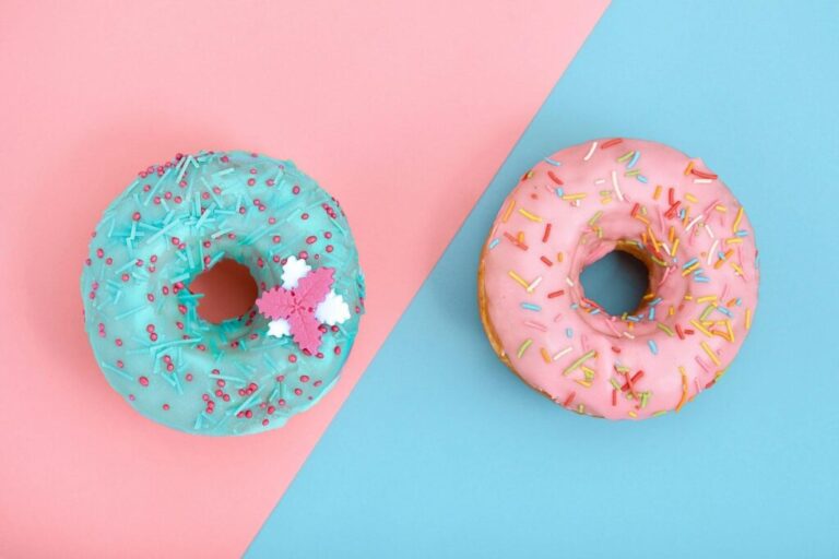 Sweet donuts, blue on pink, pink on blue. Concept conflict of contradictions, individuality in the