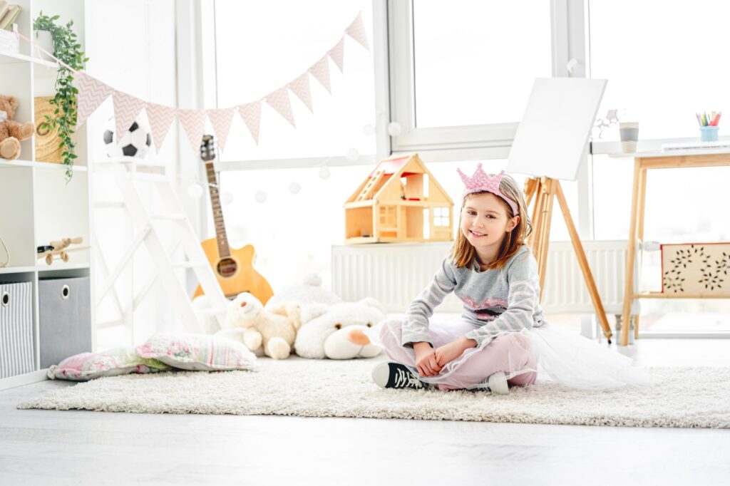 Cute princess in children's room