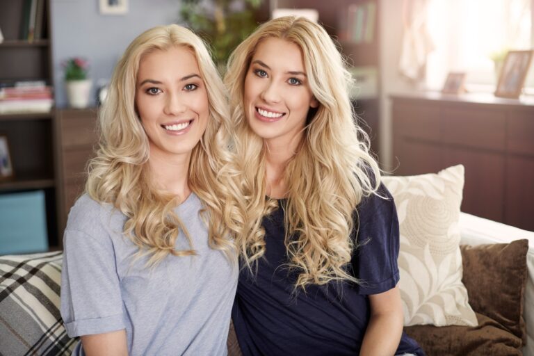 Portrait of beautiful twins at home