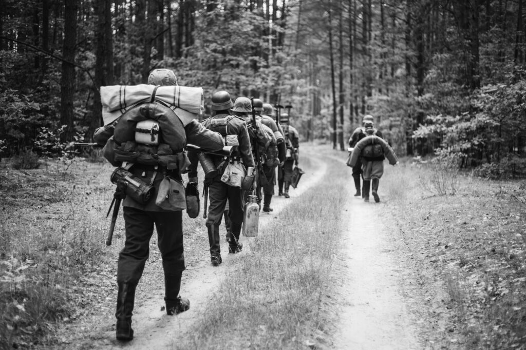 Re-enactors Dressed As German Infantry Soldiers In World War II