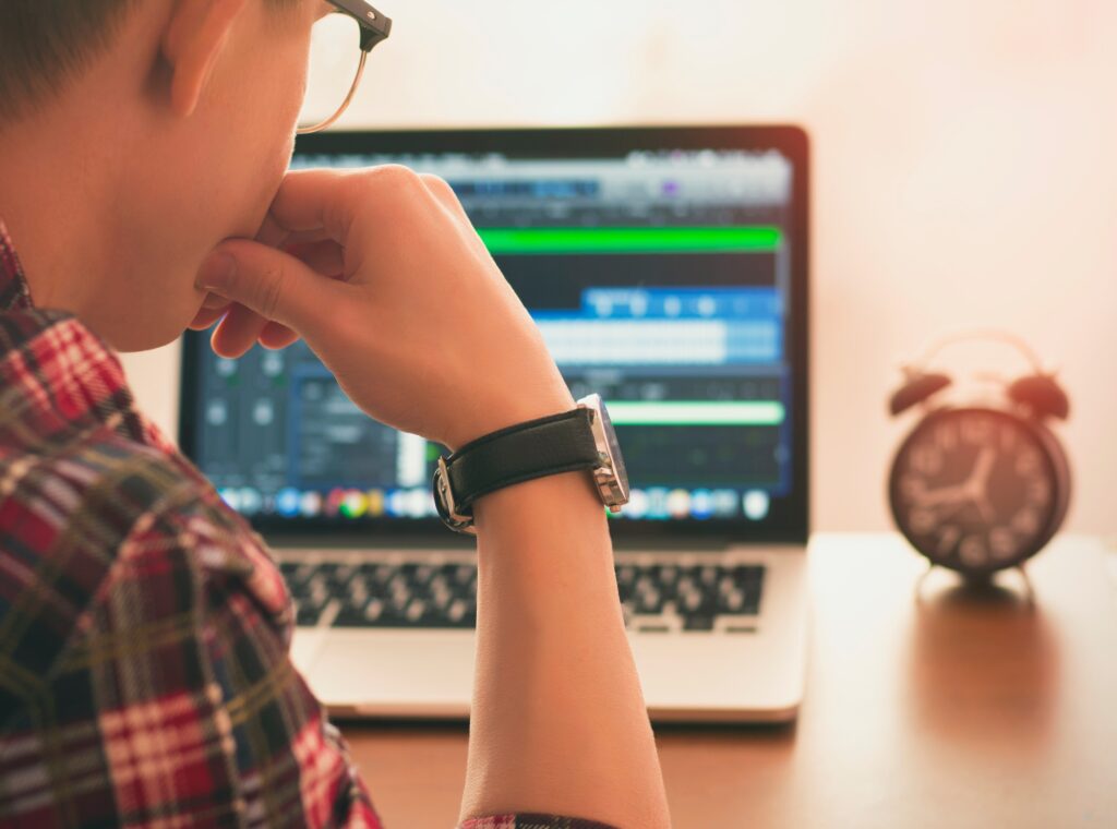 Young man using laptop.