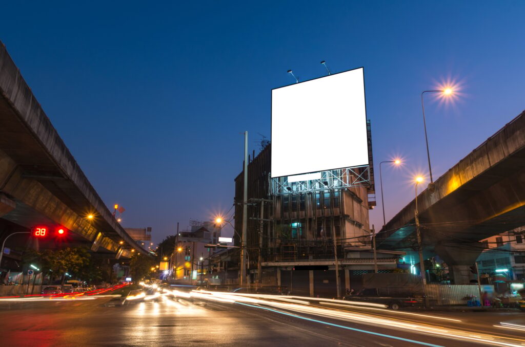 Blank billboard for advertisement at twilight time